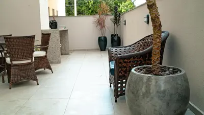 Uma área de estar em Apartamento TOP Garden com SPA a 550 m da Praia