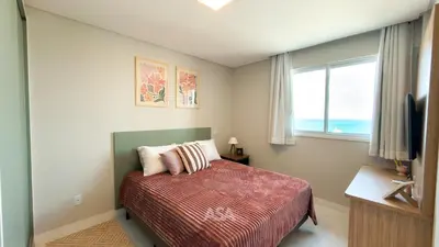 Uma cama ou camas num quarto em ASA | Vista Mar | 3QT | Alto Padrão | Itapema