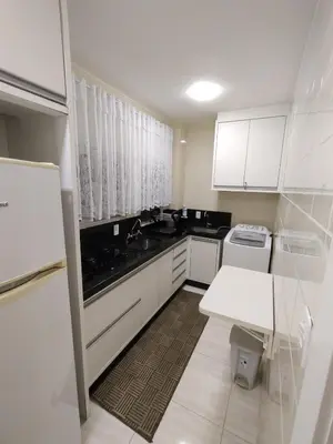 A cozinha ou kitchenette de Aconchegante apartamento próximo ao mar!
