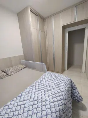 Uma cama ou camas num quarto em Aconchegante apartamento próximo ao mar!