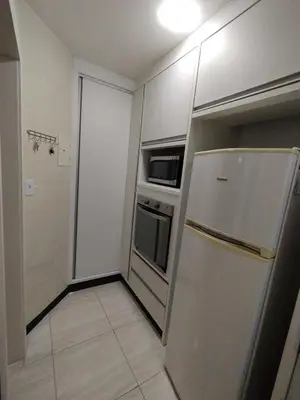A cozinha ou kitchenette de Aconchegante apartamento próximo ao mar!