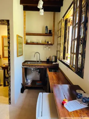 A cozinha ou kitchenette de Cabana na Natureza Com Hidro - Baoba Suites