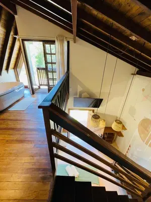 Uma cama ou camas num quarto em Cabana na Natureza Com Hidro - Baoba Suites