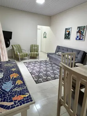 Uma área de estar em Casa Completa litoral SC com 4 qtos com ar condicionado e Aceita Pets