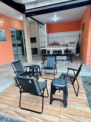Uma área de estar em Casa Completa litoral SC com 4 qtos com ar condicionado e Aceita Pets