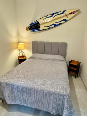 Uma cama ou camas num quarto em Casa Completa litoral SC com 4 qtos com ar condicionado e Aceita Pets