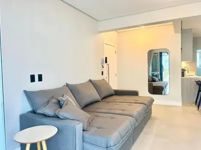 Uma área de estar em Perfeita! Cobertura na Praia de Palmas! - DK03J
