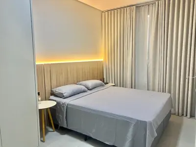 Uma cama ou camas num quarto em Perfeita! Cobertura na Praia de Palmas! - DK03J