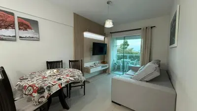 Uma cama ou camas num quarto em Apartamento com 2 quartos no centro de Bombinhas