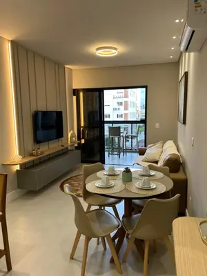 Uma área de estar em Apartamento Praia de Palmas Governador Celso Ramos SC - 300mts do mar
