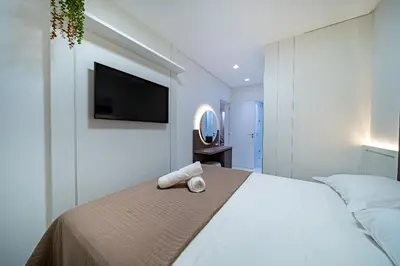A planta de Farol de Bombas 101 - Apartamento Premium na Avenida Principal 3 Suítes e Vista Mar - Praia de Bombas
