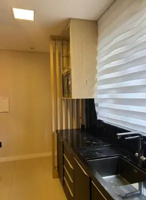 A cozinha ou kitchenette de Apartamento proximo ao mar no melhor da Meia Praia