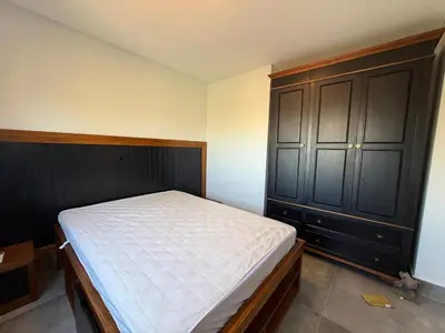 Uma cama ou camas num quarto em Cobertura no coração de Mariscal para locação de temporada em Bombinhas SC!