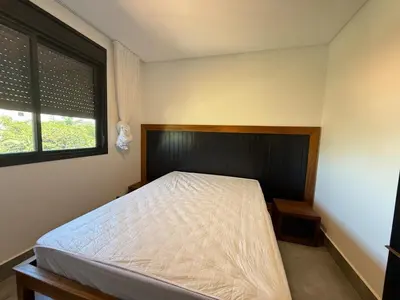 Uma cama ou camas num quarto em Cobertura no coração de Mariscal para locação de temporada em Bombinhas SC!