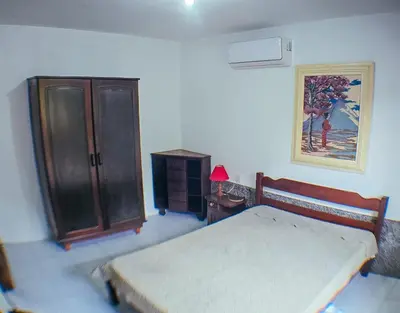 Uma cama ou camas num quarto em Sobrado da Salete Térreo