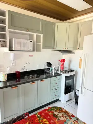 A cozinha ou kitchenette de Cobertura a 130 metros do mar Canto Grande