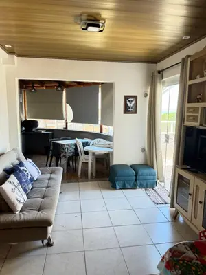 Uma televisão e/ou sistema de entretenimento em Cobertura a 130 metros do mar Canto Grande