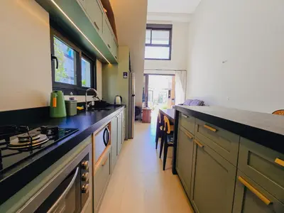 A cozinha ou kitchenette de Apartamento Térreo com churrasqueira e baranda a 90mts da Praia de Canto Grande
