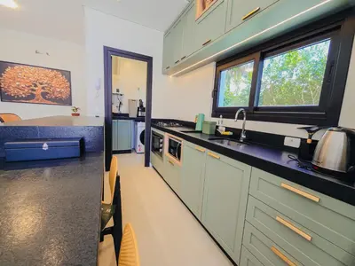 A cozinha ou kitchenette de Apartamento Térreo com churrasqueira e baranda a 90mts da Praia de Canto Grande