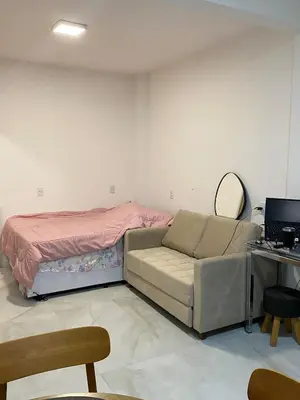 Uma área de estar em Studio para Descansar no Réveillon