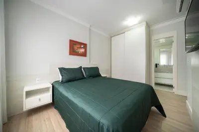 Uma cama ou camas num quarto em Varandas do Atlântico 203A – Frente Mar em Bombas