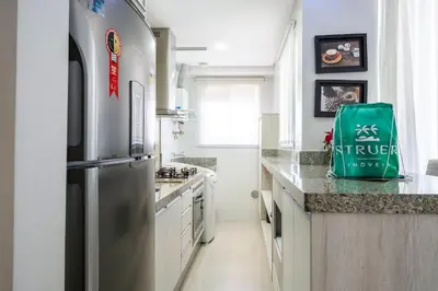 A cozinha ou kitchenette de Varandas do Atlântico 203A – Frente Mar em Bombas