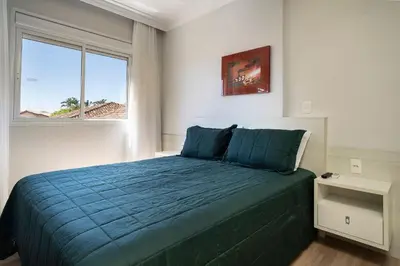 Uma cama ou camas num quarto em Varandas do Atlântico 203A – Frente Mar em Bombas