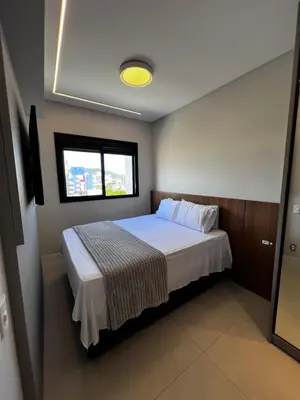 Uma cama ou camas num quarto em Apartamento 2 quartos pertinho do mar