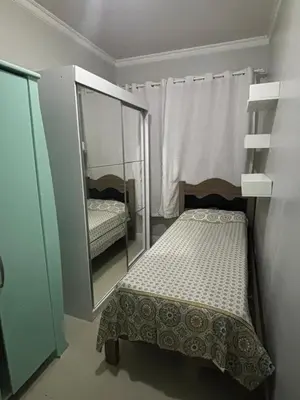 Uma cama ou camas num quarto em Casa ampla, lugar tranquilo