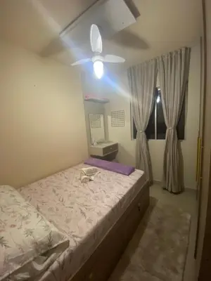 Uma cama ou camas num quarto em Lindo apartamento em Balneário Camboriú próximo as praias