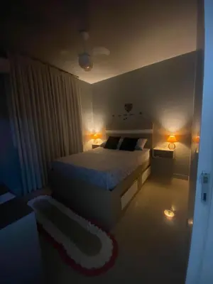 Uma cama ou camas num quarto em Lindo apartamento em Balneário Camboriú próximo as praias