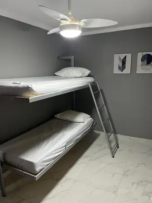 Uma cama ou camas num quarto em Casa de Ferias na praia do Estaleirinho