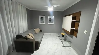 Uma área de estar em Casa de Ferias na praia do Estaleirinho