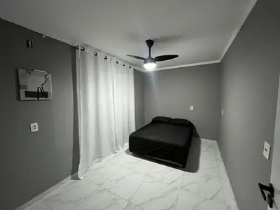 Uma cama ou camas num quarto em Casa de Ferias na praia do Estaleirinho