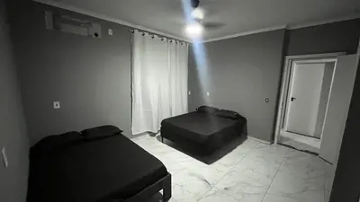 Uma área de estar em Casa de Ferias na praia do Estaleirinho