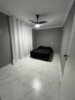 Uma cama ou camas num quarto em Casa de Ferias na praia do Estaleirinho