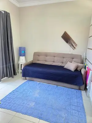Uma cama ou camas num quarto em Refugio Bombinhas - Residencial Maria Olga