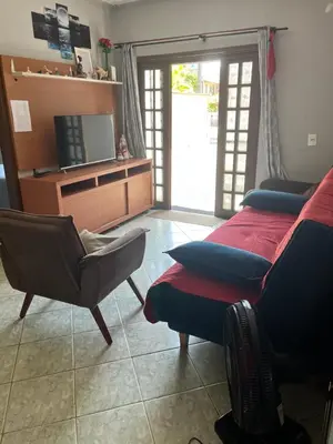 Uma cama ou camas num quarto em casa morada da praia