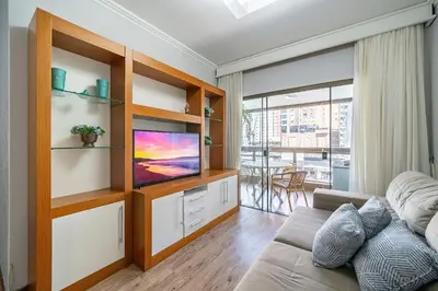 Uma televisão e/ou sistema de entretenimento em Achei Itapema • João Caetano Residencial, R.280