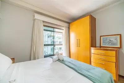 Uma cama ou camas num quarto em Achei Itapema • João Caetano Residencial, R.280