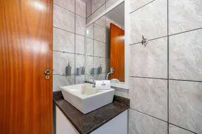 Uma casa de banho em Achei Itapema • João Caetano Residencial, R.280