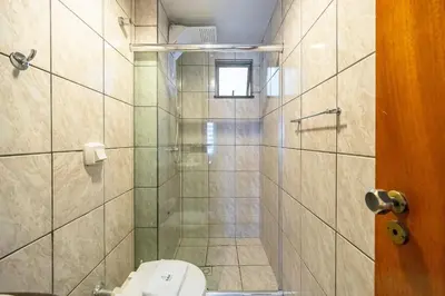 Uma casa de banho em Achei Itapema • João Caetano Residencial, R.280