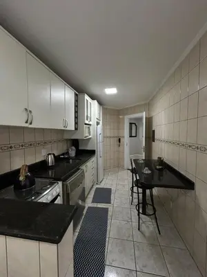 A cozinha ou kitchenette de Apartamento a 60m da praia com ar-condicionado