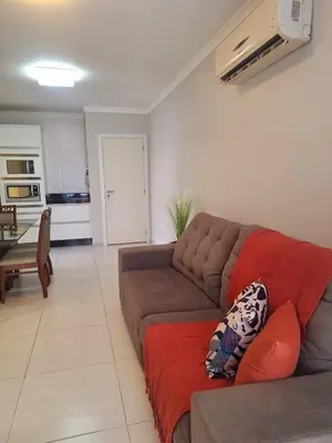 Uma área de estar em APARTAMENTO, PRAIA DE Bombas,Bombinhas, sc