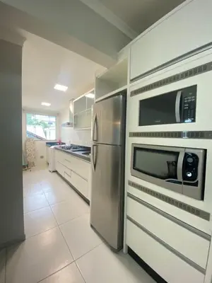 A cozinha ou kitchenette de APARTAMENTO, PRAIA DE Bombas,Bombinhas, sc