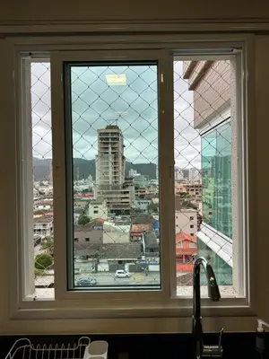 Uma vista geral de Itapema ou a vista da cidade a partir do apartamento