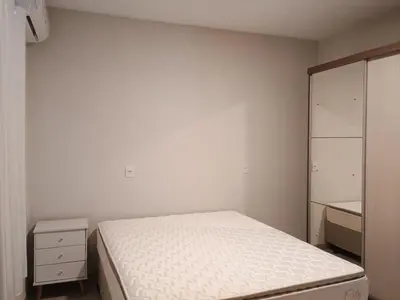 Uma cama ou camas num quarto em Casa em Bombinhas- praia de Zimbros
