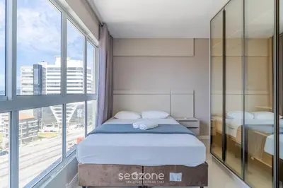 Uma cama ou camas num quarto em Apto Vista Mar a 500 m da Praia ROO0401