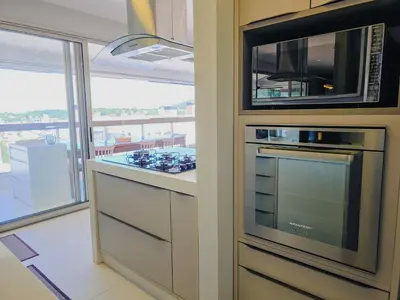 A cozinha ou kitchenette de Apartamento Para Locação No Centro de Bombinhas