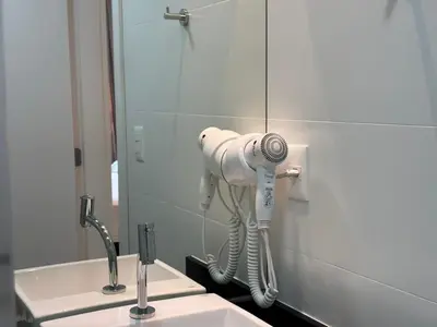 Uma casa de banho em Vista Mar - Suíte, Cozinha Completa, Até 4 pessoas